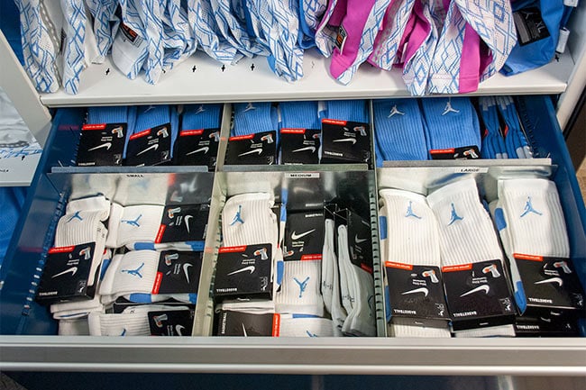 Athletic Gear Stored in Modular Drawer Cabinets