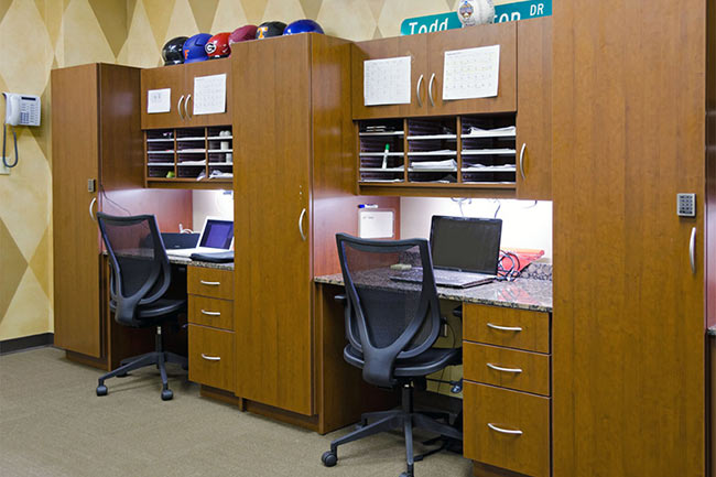 Modular Casework for Athletic Department Workstations