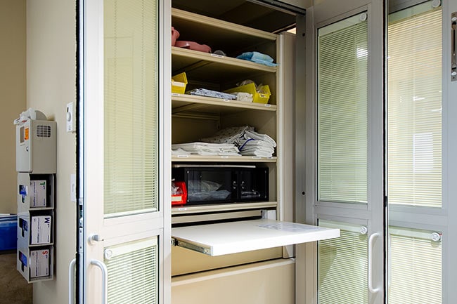 Patient Room Supplies Stored in CoreSTOR Patient Server Cabinet