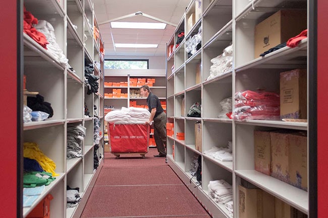 Organized Laundry Area with Compact Shelving and Storage