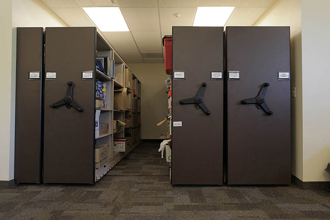 Library Equipment Organized on Compact Mobile Shelving