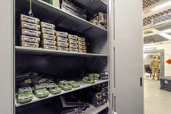4-Post Shelving with Doors Storing Military Comms Equipment