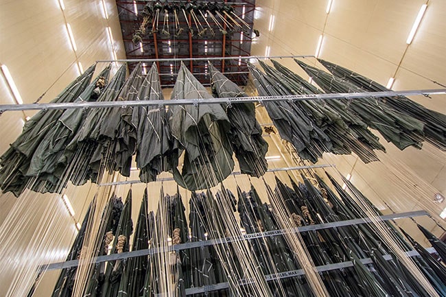 Military Parachute Lifts in a Drying Tower