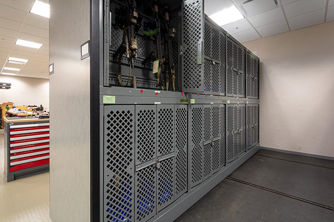 Secure Military Storage with Universal Weapons Rack